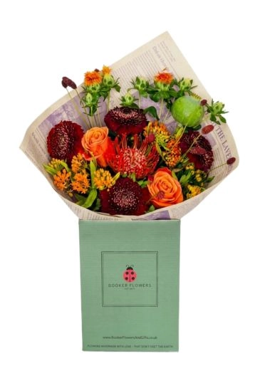 Autumn Harvest Delight hand tied bouquet in water