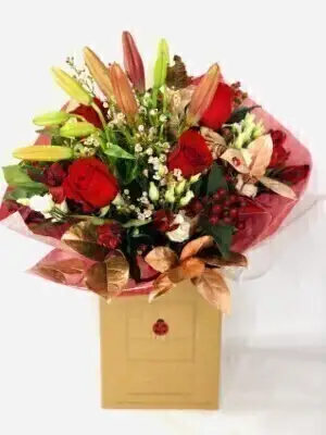 Christmas Enchantment Red Rose and Lily Handtied