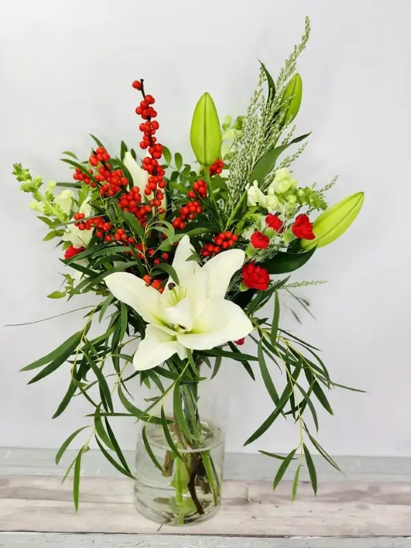 Christmas Holiday Vase of Lilies and Berries
